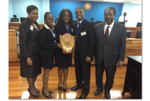 Carla Card-Stubbs, Coach, Crystal Newman, Lowrell Edgecombe, Krisspin Sands and Sir Denise Byron, President of the Caribbean Court of Justice