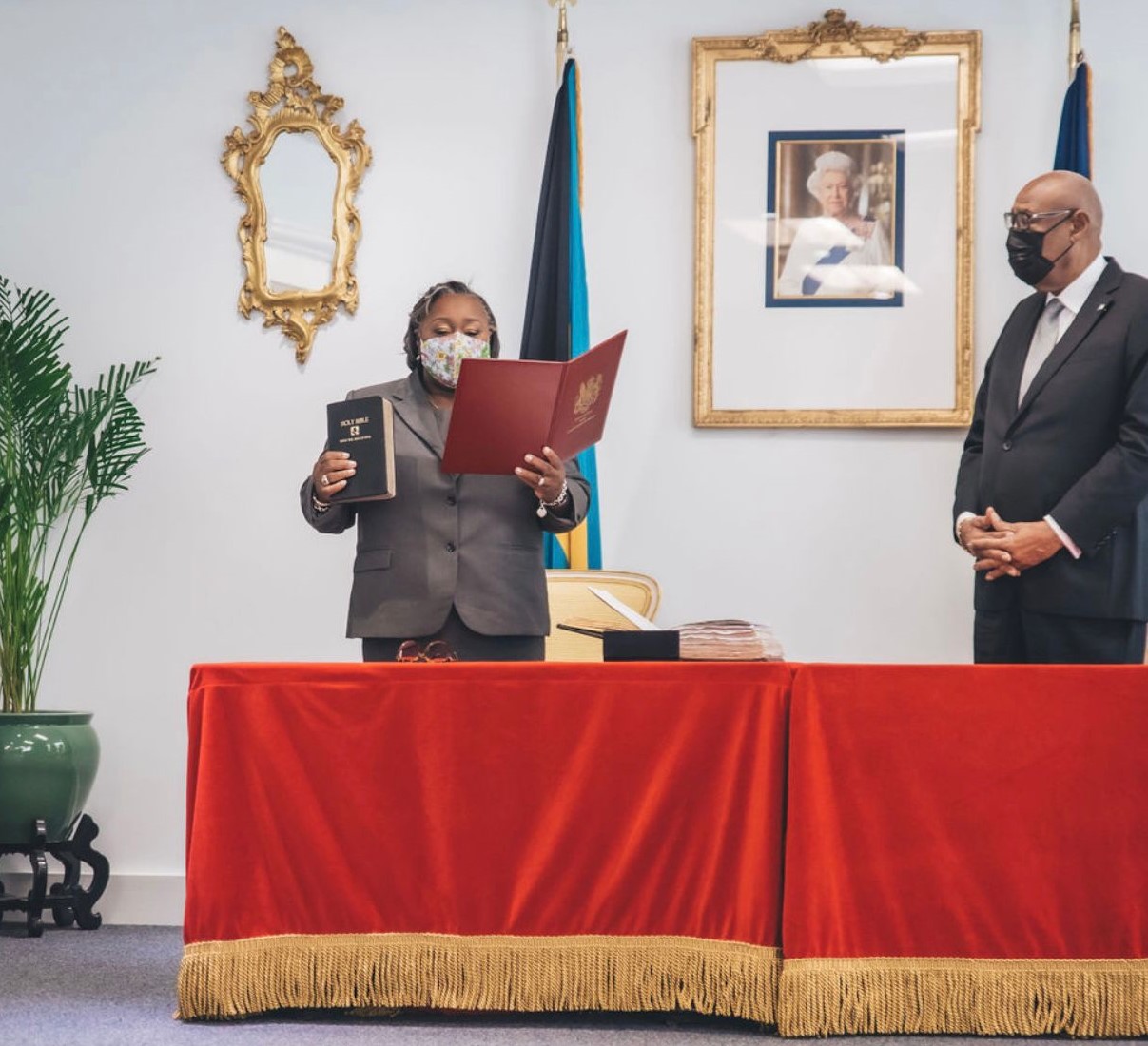 Madam Justice Juanita Denise Lewis-Johnson being sworn in by His Excellency Sir Cornelius A. Smith, GCMG, Governor General of The Bahamas.