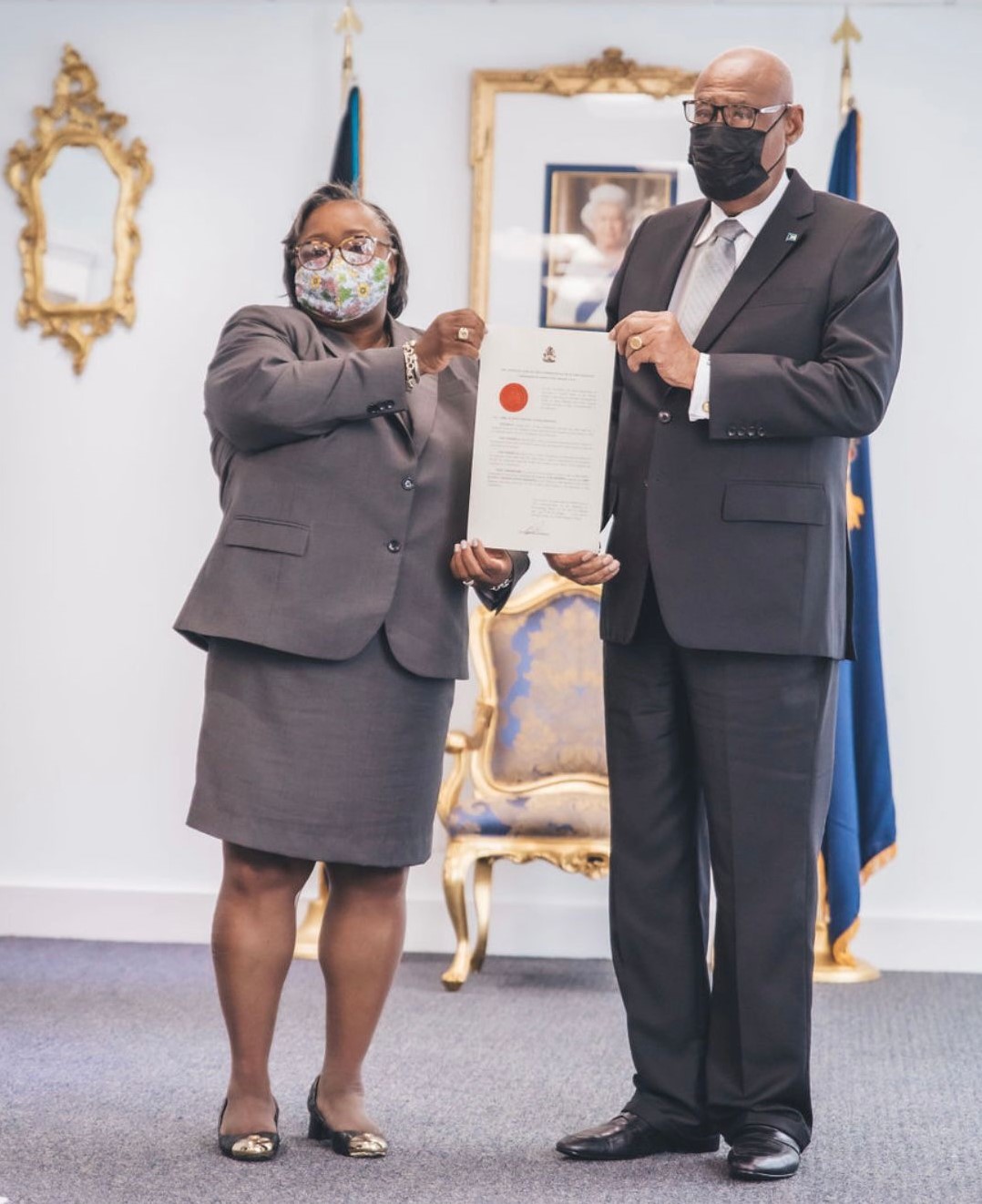 Madam Justice Juanita Denise Lewis-Johnson photographed with His Excellency Sir Cornelius A. Smith, GCMG Governor General of The Bahamas.